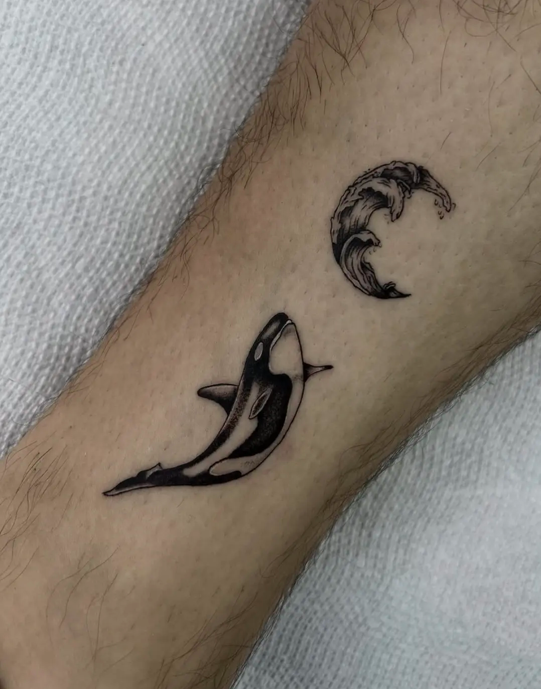 Whale and wave tattoo by Randy 